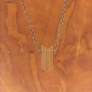 Gold, silver, and copper necklace